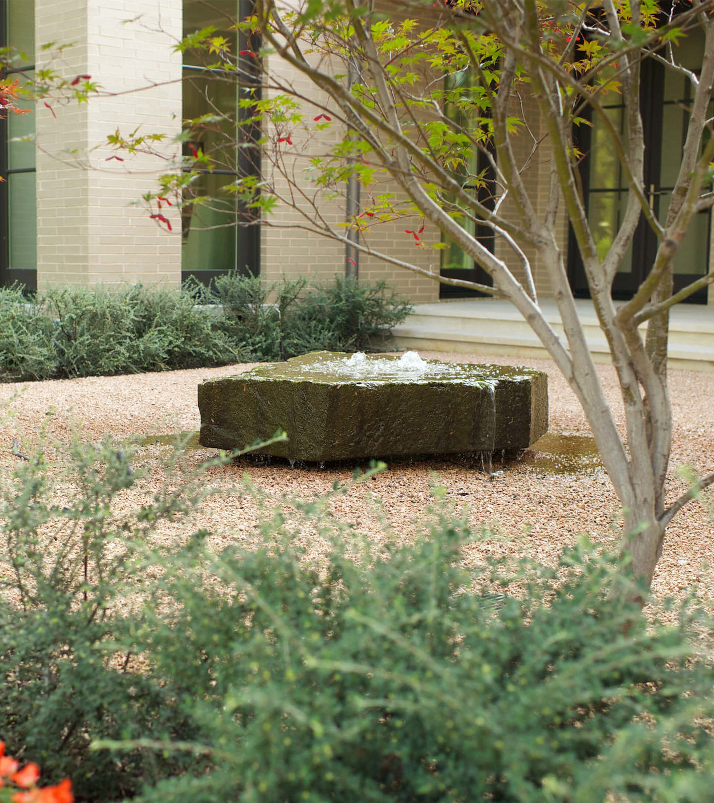 Forest-Court-Water-Feature-Custom-Pool-Hardscape-Detailing-Bonick-Landscaping