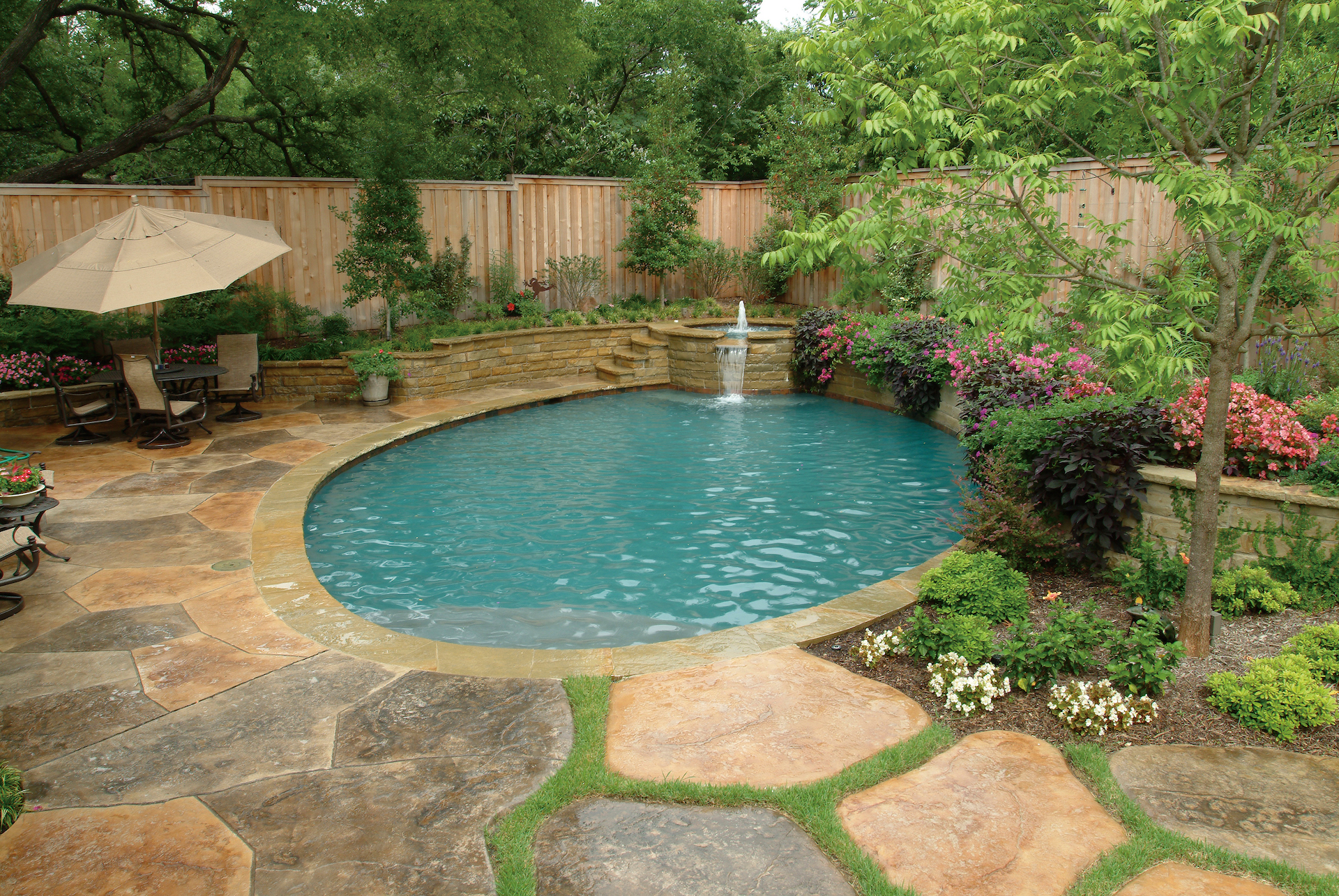 Stamped concrete patio and swimming pool at Dallas, TX residence.