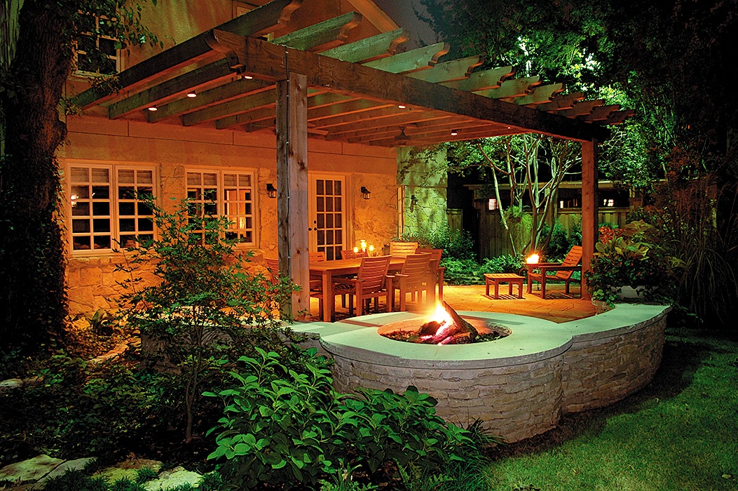 Custom built cedar pergola with fire pit in Dallas