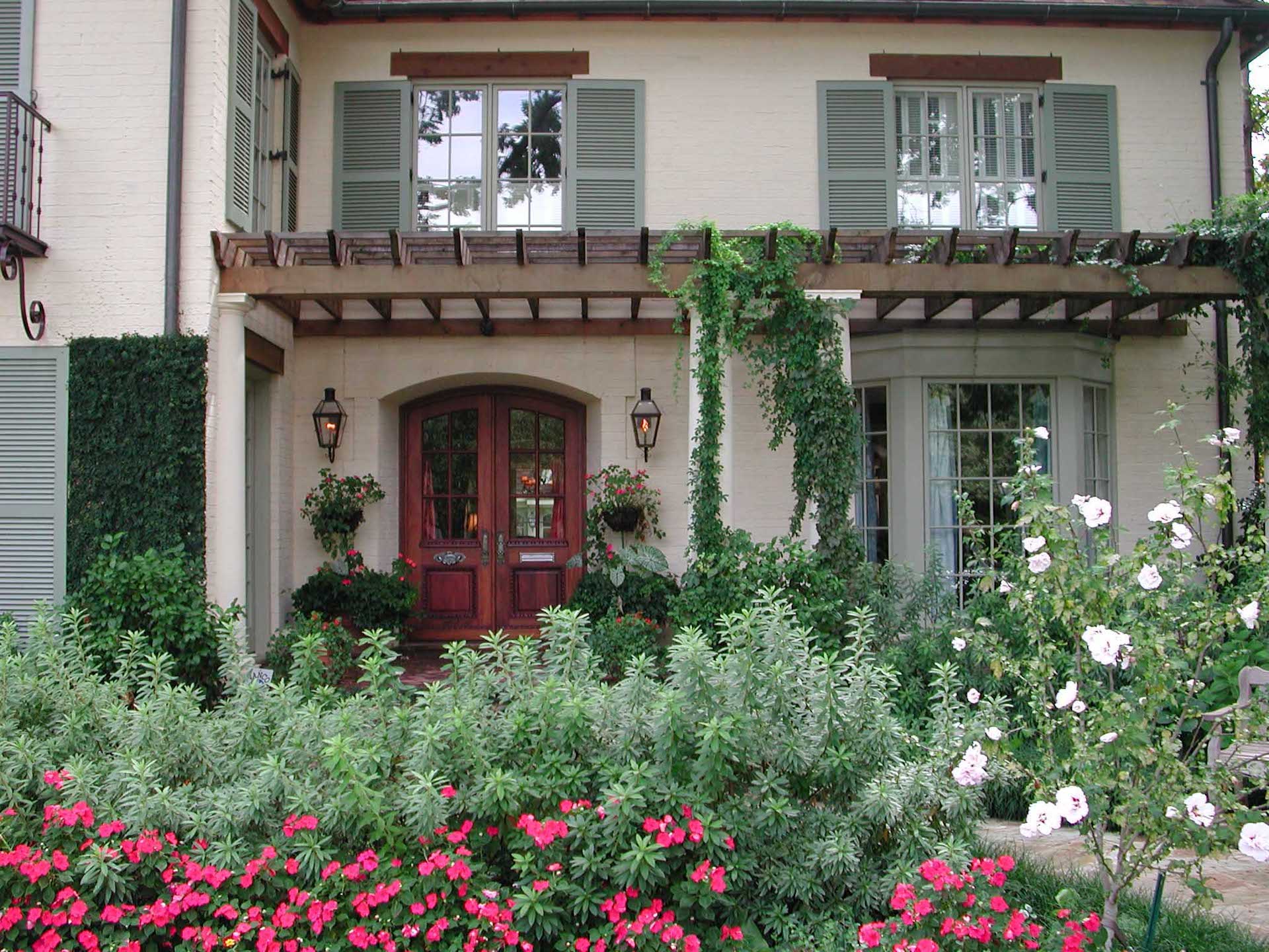 Romantic Dallas garden with rosemary and flowers.