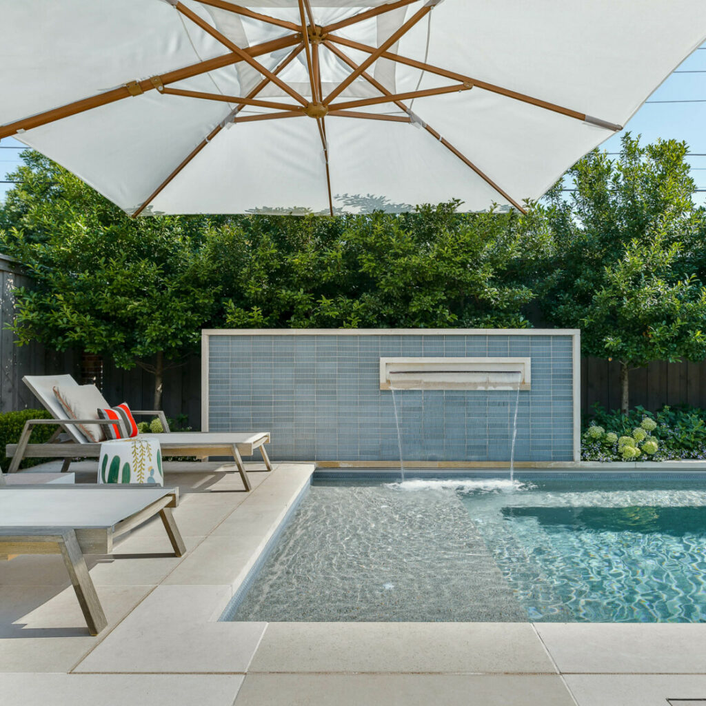 Wentwood pool fountain with Tuuci parasol