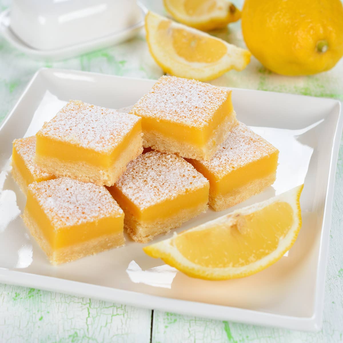 Traditional lemon bars on a white table